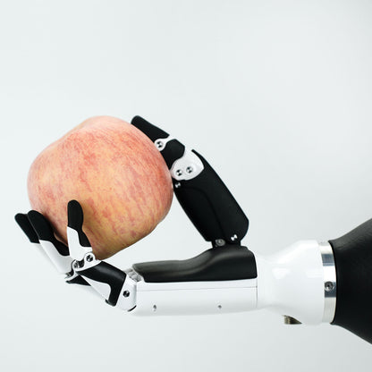 Inspire Robot Dexterous Hand Holding Apple