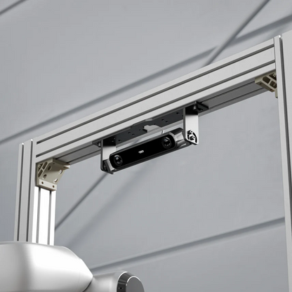 Ceiling-mounted security camera with metal frame on a gray background