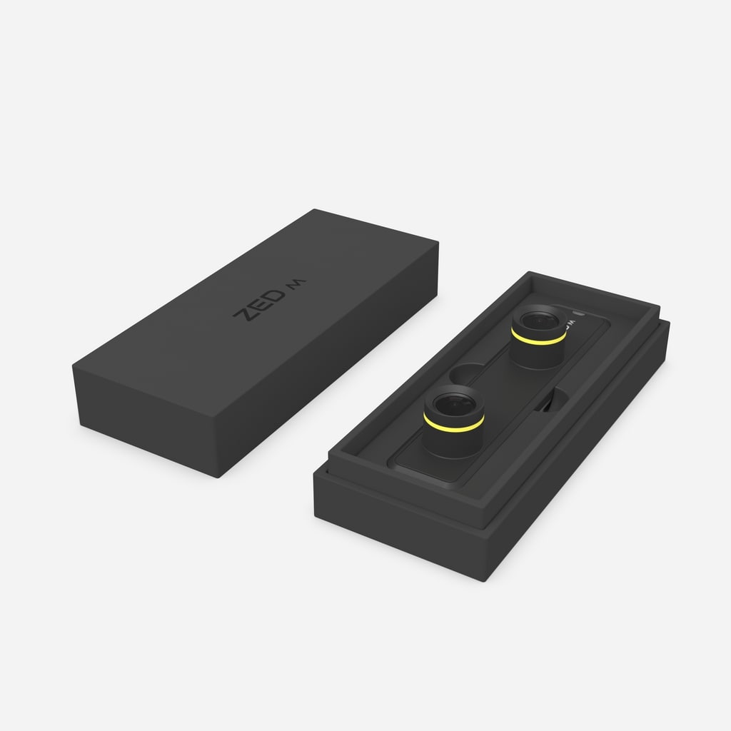 Stereolabs ZED Mini stereo camera, a compact vision sensor used for high-definition 3D mapping and accurate environmental depth detection